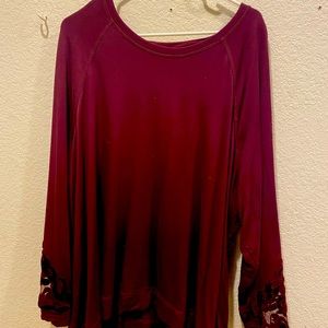 Maurice’s size 3x 95% rayon 5% spandex with sheer cutouts on sleeves and back.